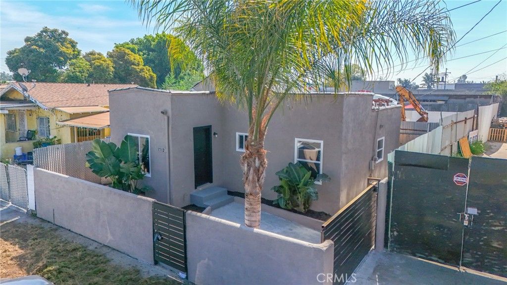 Photo of 1712 E 57th St, Los Angeles, CA 90058 (MLS # DW26064382)