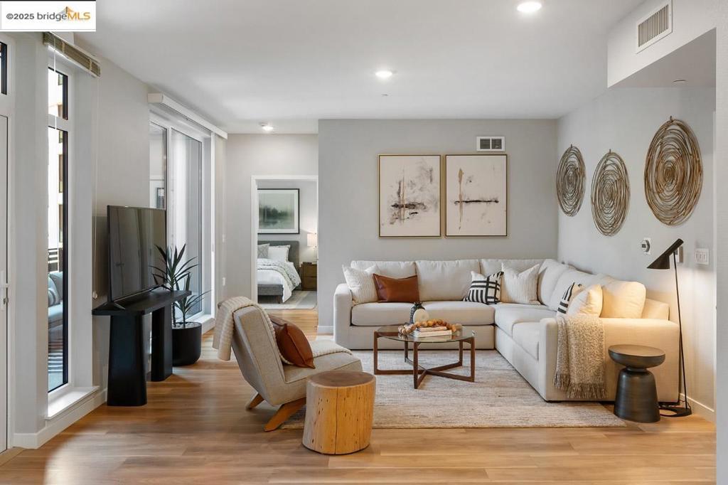 Now Selling at Caspian Residences at Brooklyn Basin - Discover modern waterside living in this thoughtfully designed 2-bedroom, 2-bathroom condo with a balcony, spanning approximately 1,035 sq ft. Located in one of Oakland’s most exciting new communities, this home offers a rare chance to own in a vibrant, amenity-rich setting. The open layout features sleek finishes, a well-equipped kitchen with Samsung stainless steel appliances, quartz countertops, and modern cabinetry. High-efficiency dual-pane windows frame the bright living area, while the bathroom includes quartz counters and Grohe fixtures. Includes in-unit washer and dryer. Caspian residents enjoy landscaped courtyards, a game room, a fitness center, co-working spaces, and top-floor lounges with panoramic views. Situated on Oakland’s revitalized waterfront at Brooklyn Basin, the community provides direct access to parks, dining, and recreation, with Jack London Square, BART, and ferry service to San Francisco just minutes away. Includes one parking space. Originally launched as modern apartments and professionally managed since 2023, Caspian is now offered as a limited collection of condominiums—already complete, established, and thriving.