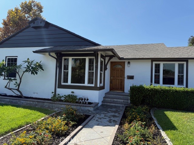 Beautifully remodeled 4-Bed, 3-Bath home on a quiet cul-de-sac street! Main house features 3 beds and 2 baths. Plus, ADU in the rear, (with separate private entrance). Both living spaces include Stainmaster vinyl flooring throughout, recessed lighting, and quartz kitchen & bath countertops. Separate individual laundry room inside off kitchen. Water softener. Covered patio off den, just outside the slider door and beautifully landscaped backyard. Dual pane windows and doors throughout. High efficiency heat-pump HVAC with Central A/C. 2-Car detached garage with RV Access including dedicated 50-AMP RV plug. Owner owned & paid-off SOLAR provides energy savings! Wheelchair access in front house. ADU in back has it's own mini-split heating & A/C system that's perfect for guests, extended family, or extra income. MOVE-IN READY and full of modern comfort!