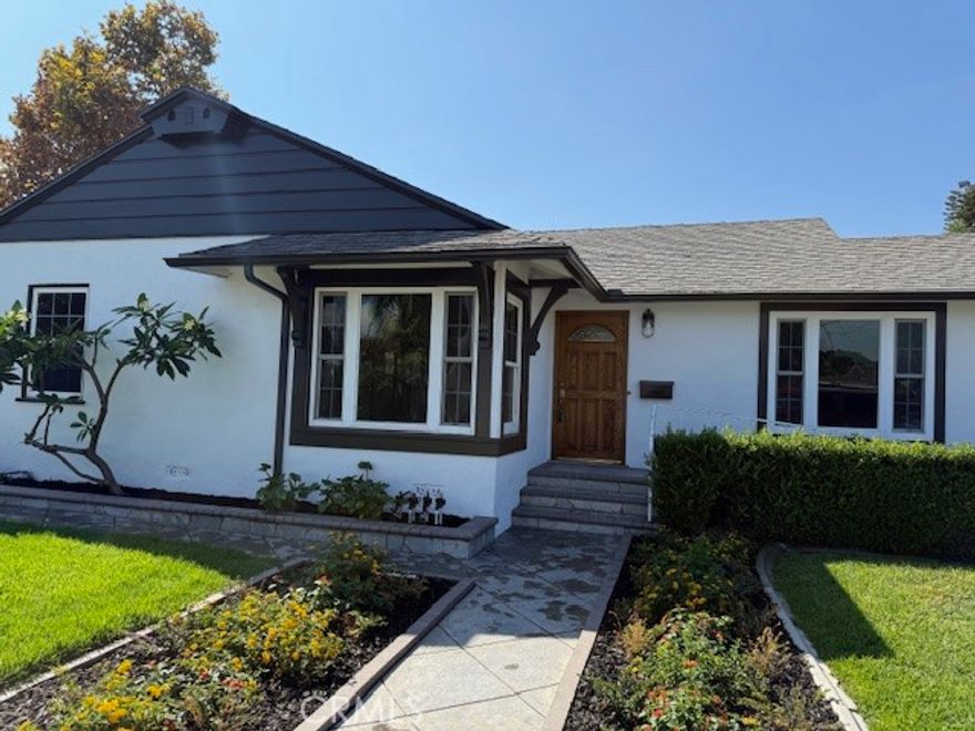 Beautifully remodeled 4-Bed, 3-Bath home on a quiet cul-de-sac street! Main house features 3 beds and 2 baths. Plus, ADU in the rear, (with separate private entrance). Both living spaces include Stainmaster vinyl flooring throughout, recessed lighting, and quartz kitchen & bath countertops. Separate individual laundry room inside off kitchen. Water softener. Covered patio off den, just outside the slider door and beautifully landscaped backyard. Dual pane windows and doors throughout. High efficiency heat-pump HVAC with Central A/C. 2-Car detached garage with RV Access including dedicated 50-AMP RV plug. Owner owned & paid-off SOLAR provides energy savings! Wheelchair access in front house. ADU in back has it's own mini-split heating & A/C system that's perfect for guests, extended family, or extra income. MOVE-IN READY and full of modern comfort!