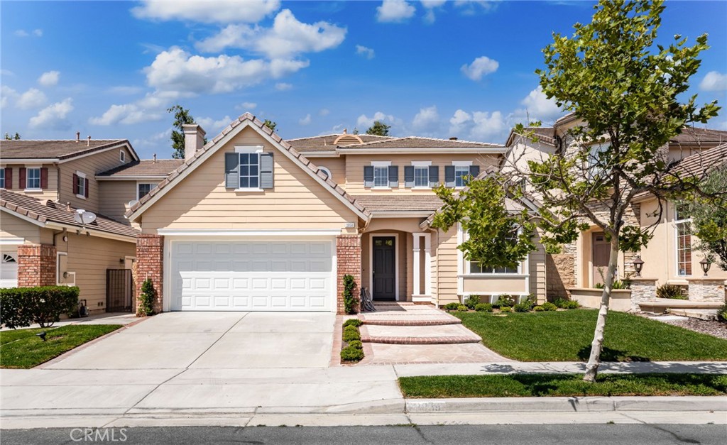 Lovely Olinda Ranch Home with Main Floor Bedroom & Bath, Peaceful Views, and Sought after Brea Location!
Welcome to the home you've been waiting for! This beautifully appointed residence features a main floor bedroom and bathroom, peaceful views, and multiple outdoor living spaces including an oversized balcony, covered patio, and a charming stone-covered front porch.
Step inside through the formal entry into a dramatic living room with soaring two-story ceilings and a wall of impressive windows that fill the space with natural light. Adjacent, the formal dining room is perfect for entertaining, complete with a butler’s pantry offering ample storage and direct kitchen access. The heart of the home is the chef-inspired kitchen, boasting abundant counter space, an island with built-in drawers, walk-in pantry, and an expansive bank of upper and lower cabinets. A cozy nook and the open-concept family room with a brick fireplace and entertainment niche create the perfect gathering space.
Step outside to your private backyard oasis featuring a large covered patio,lawn, and three tranquil garden spaces—ideal for entertaining or relaxing in peace.
The main floor also features a private bedroom and full bath, ideal for guests or multi-generational living. Upstairs, discover two spacious secondary bedrooms, a full bath, and a built-in desk/study area. The luxurious primary suite includes double French doors opening to a private balcony with peaceful views, a spa-like bathroom with double sinks, soaking tub, separate shower, and a generous walk-in closet.
Additional highlights include:
Massive laundry room with sink and ample cabinetry
3-car tandem garage with potential to convert the third bay into a home office, game room, or 5th bedroom
Sought-after Brea Olinda School District
Just across the street from Olinda Ranch is Carbon Canyon Regional Park with its lake, tennis courts, hiking trails, and redwood grove
Close to La Floresta, Brea Mall, and the Brea Promenade for dining and shopping
Near sports and dog parks
Don’t miss your opportunity to own this thoughtfully designed and perfectly located home!