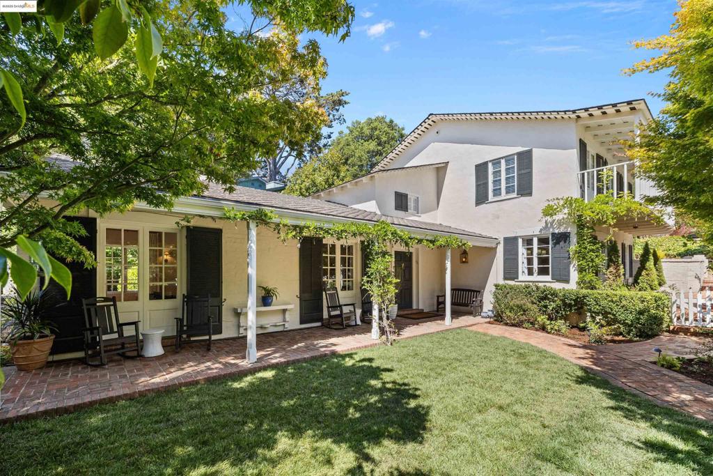 Tucked along the coveted Piedmont border and just moments from Montclair Village, this charming 3++ Bed, 2.5 Bath home blends elegance with comfort. Set on an oversized lot, it features lush gardens, an attached garage, off-street parking, EV charging and Solar along with a new AC unit. Inside, vaulted ceilings, exposed beams, countless built-ins and sunlit spaces bring warmth and character. The main level grand living room, formal dining room, quaint breakfast nook, bonus room, and a dedicated office offer flexibility for both daily living and entertaining. The oversized primary with en-suite bath and two additional bedrooms with an adjoining bathroom fill the upstairs. The mature, flowering landscape wraps the home in privacy and beauty. With abundant storage, a graceful layout, and seamless indoor-outdoor flow, this home is as functional as it is enchanting. The prime location offers easy access to Montclair’s shops and restaurants, plus nearby parks and major thoroughfares making it an exceptionally convenient serene retreat.