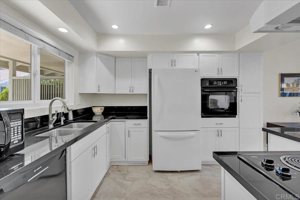 Welcome to this quiet and relaxing single story, 55+home, in the Community of Oceana. This home offers (3) bedrooms, (2) baths, front bedroom can be used as an additional office, and/or game room. This home is spacious, light and bright, has high ceilings and an open feel. Remodeled kitchen and ADA bathroom; new paint in the front bedroom/office & newer HVAC, new carpet as well. Washer/Dryer/Refrigerator and microwave included. One car detached garage included. Rec Center includes two swimming pools, two pickleball courts, exercise room. The HOA pays basic cable TV, water trash, and landscaping maintenance. FALL IN LOVE WITH PANORAMIC VIEWS , Welcome to beautiful Oceana!!