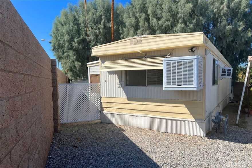 LOCATION! LOCATION! LOCATION! The community of Rancho Mirage RV & Mobile Village offers affordable living in the heart of Coachella Valley, This 1 Bed 1 Bath unit has been rehabbed and in move-in condition. Washer Dryer Hook ups! Large Yard with Mature Shade Trees Enjoy the Communiuty Pool and beautiful mountain views! Other untis available too!