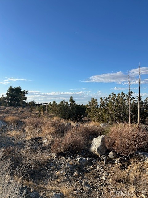 Experience the beauty of desert living with this stunning 2+ acre parcel nestled in the serene community of South Pinon Hills. Enjoy breathtaking sunrise and sunset views surrounded by wide-open skies and peaceful rural charm. This spacious lot offers plenty of room to spread out, build your custom dream home, and bring all your toys — perfect for off-road adventures, animals, or simply enjoying your privacy. Conveniently located near paved roads and commuter routes, yet far enough to embrace the tranquil desert lifestyle you’ve been searching for.
Want more property? An additional contiguous lot is available, giving you the opportunity to own nearly 5 acres combined!