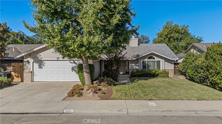Welcome to this beautifully updated single-story home on a quiet cul-de-sac in North Merced. Offering 3 bedrooms, 2 bathrooms, and approx. 1,665 sq. ft., this home features fresh upgrades including new ceiling fixtures, dual-pane windows throughout, a newer A/C unit, and water heater. The spacious living room includes vaulted ceilings, abundant natural light, and a dual-sided fireplace that also warms the dining or family room. The bright kitchen offers white cabinetry, tile counters, breakfast bar seating, and stainless-steel appliances- stove, microwave & dishwasher. The primary suite has vaulted ceilings and an ensuite bath with tile counters & shower stall. Additional highlights include updated flooring throughout and an inside laundry area. The private backyard offers a patio, lawn, and garden beds perfect for entertaining or relaxing. Conveniently located near Merced College, UC Merced, Mercy Medical Center, shopping and parks.   Move-in ready and full of modern touches!