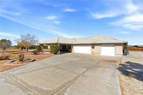 Photo of 7330 Smoke Tree Rd, Phelan, CA 92371 (MLS # CV26037431)