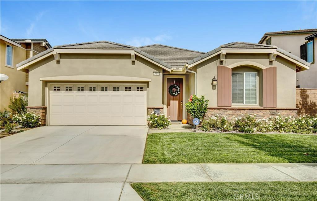 This exceptional home is everything you’ve been looking for—and more. Thoughtfully designed with top-of-the-line upgrades, it features custom flooring throughout, a gourmet kitchen with an oversized quartz island ideal for entertaining, and stylish finishes in every bedroom and bathroom—no detail has been spared. Nestled in the prestigious gated Cornerstone Community, this spacious single-story home offers the best in open-concept living. Equipped with solar panels, this home offers long-term savings on your utility bills.Conveniently located just minutes from Victoria Gardens, major freeways, and highly rated Etiwanda schools, it checks every box on your wishlist.