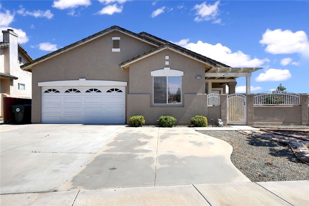 Charming, well maintained, single-story home in a great location on a very large private lot. This beautiful home has an open floor plan with a kitchen opening to the living room. Living room has high ceilings, brick framed fireplace and sliding door leading to the back patio. The kitchen has quartz counter tops, subway tile back splash, center island, stainless steel appliances, recessed lighting and open shelves. Three spacious bedrooms and 2 bathrooms. Main suite has own bathroom. Property is fully fenced all around with block wall fencing in the back/side and block walls and wrought iron fencing in front. Other amenities are: Semi-covered concrete porch, laundry closet inside, front covered porch, large lot with room for a pool and garden. Close to schools, shops, freeways (15, 91 and 60), golf courses, entertainment, restaurant and much more.