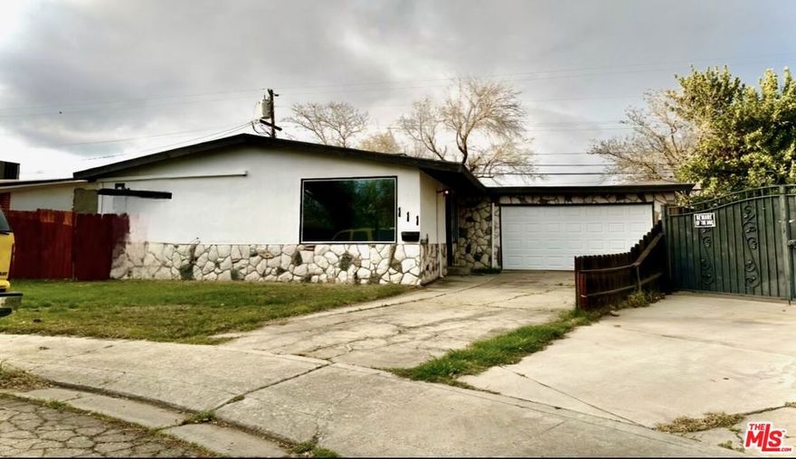 Lots of parking in the driveway and side along with two car garage. Beautiful vaulted ceiling in bedrooms and family room. Large backyard with shed and side patio. Don't miss out this charming home in a cul- de-sac.