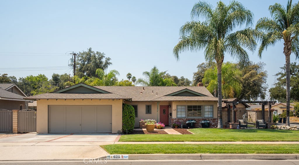 Discover serenity at 625 Cardinal Lane. This retreat offers 3 bedrooms
and 2 bathrooms within a comfortable 1,750 square feet. (this includes the bonus room)
Inside, enjoy the comfort of newer upgrades including central air and
heat, complemented by a whole house fan. Other recent updates include wood-like tile
flooring, wainscoting, insulation, fresh paint, and a newer 200-amp panel. One bedroom has been thoughtfully expanded, featuring French doors that open to beautiful views of a custom sparkling pool, while another offers an en suite bathroom and built-in cabinets. The third bedroom, has a built-in day bed.
The serene interior flows effortlessly into the custom backyard through a Wood Pella slider,
unveiling a custom pool and spa. An inviting custom outdoor kitchen with a built-in BBQ and a
cozy fireplace offers a perfect setting for quiet reflection and entertaining. Surrounded by block walls, the
expansive 8,320 square foot lot is dotted with green space, a convenient shed, lush fruit trees, and
beautifully landscaped gardens.
Located on a tree-lined cul-de-sac, this home is just a short distance from the university,
offering an ideal blend of calm and convenience. Embrace the understated elegance
and tranquility of this beautiful Redlands home.