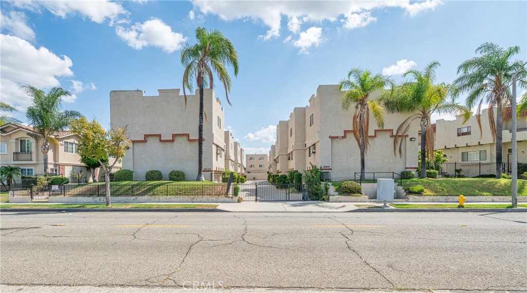 Welcome to 4000 Stewart Avenue, Unit #8, a beautifully maintained end-unit home located in the corner of a quiet and secure gated community in Baldwin Park. This spacious condo has a bright, open floor plan that seamlessly connects the living room, dining area, and kitchen. Natural light fills the interior, and sliding glass doors open to a private covered patio—perfect for morning coffee or evening relaxation. The home features numerous upgrades, including modern wooden flooring throughout, remodeled kitchen cabinetry, and an updated balcony floor. The two-car garage has been recently refinished and includes convenient direct access to the home. A new water heater, central AC & heating system, and in-garage laundry unit provide added comfort and efficiency. This community is well-maintained with a low HOA fee covering common areas, roof, and trash services. Ideally located, the property offers easy access to the 605, 10, and 210 freeways, making commuting throughout the San Gabriel Valley and Greater Los Angeles area a breeze. Don’t miss this rare opportunity to own a move-in-ready home with modern updates in a highly convenient location!