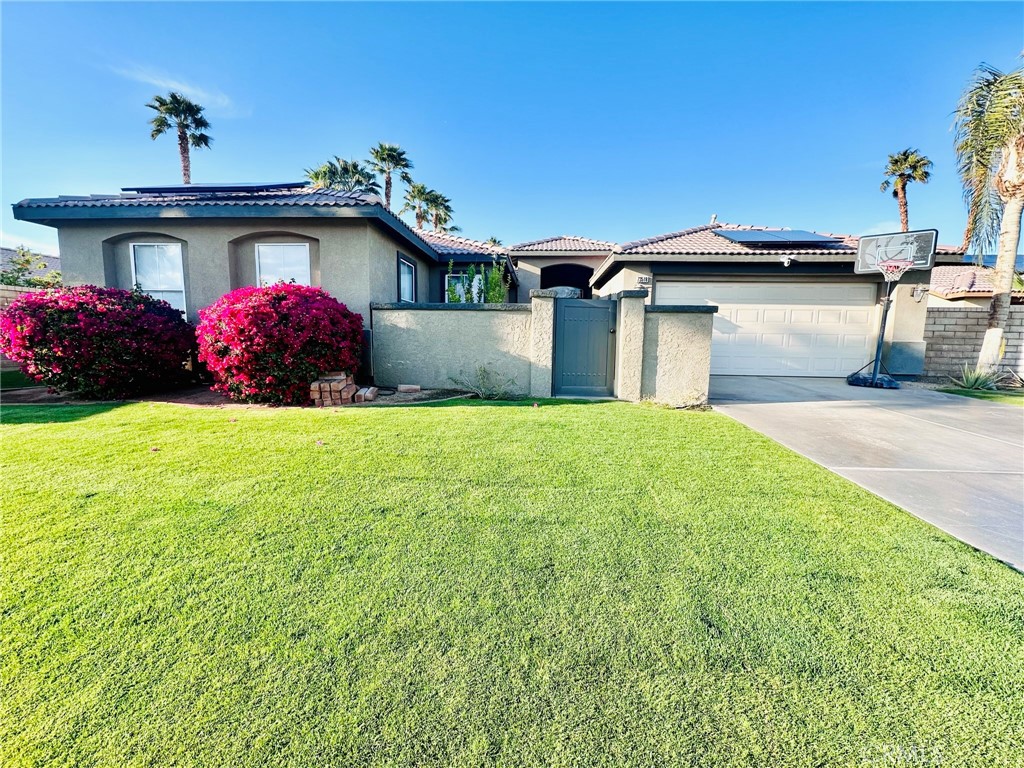 4 bedrooms, 2 bath with den area, family room, and sitting room. High ceilings and a formal living room gives the home an open and welcoming feel. Has a pool/spa, built-in grill. Ceiling fans are in every room, family room, and outdoor patio. Fully remodeled kitchen with new appliances, granite countertops, and big island with waterfall edges. Outdoor covered patio. Spacious courtyard. Two-car garage with epoxy floor, and storage. Solar panels included. School bus stop right in front of the house. Located in the heart of Palm Desert, near the I-10. Small pets allowed. Renter pays utilities- gas, water, overage with SCE. Owner pays trash, solar panels, pool maintenance and landscaping. Small pets allowed up to 20 pounds, house has a built-in doggy door. Deposit is 1 month rent. Security deposit and first month rent due at signing. No smoking.