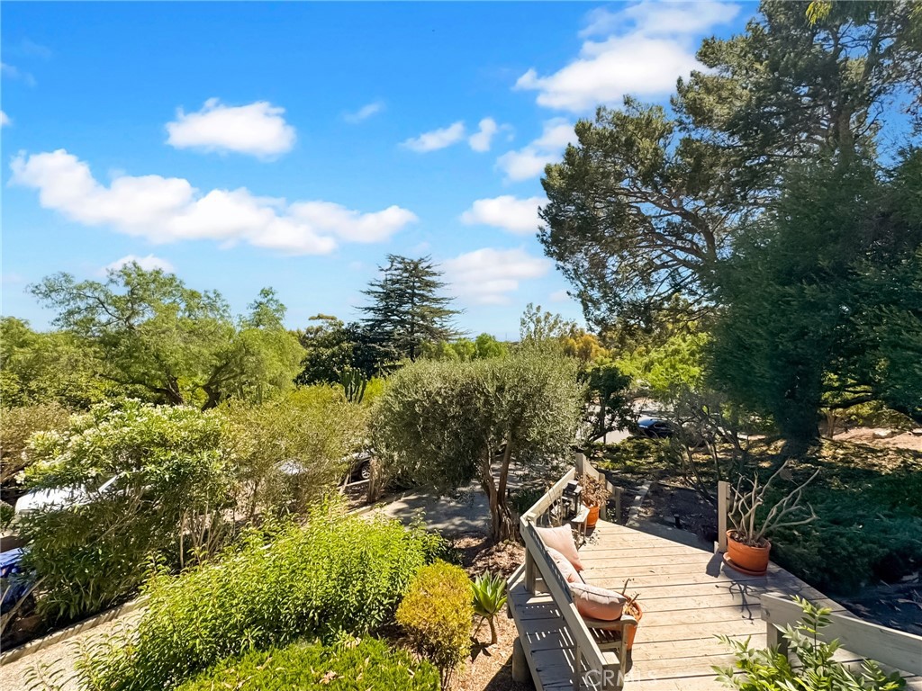 Mid-Century Modern Retreat in Portuguese Bend
4 Bedrooms • 2.5 Baths • 2,717 Sq Ft Living Space • 25,787 Sq Ft Lot
Nestled inside the serene, gated enclave of Portuguese Bend, this mid-century modern residence blends timeless architecture with the natural beauty of Rancho Palos Verdes. Set on over half an acre, the home offers space, privacy, and a sense of retreat rarely found in today’s market.
Step inside and you’ll find clean lines, expansive windows, and open living spaces that capture gentle coastal light throughout the day. Multiple gathering areas flow seamlessly to the outdoors, creating the perfect backdrop for entertaining or simply enjoying the peaceful surroundings.
From the main living areas and upper terraces, take in sparkling partial ocean views, framed by rolling hills and unspoiled landscapes. It’s a daily reminder that you are living somewhere extraordinary.
With 4 spacious bedrooms and 3 full baths, this home easily accommodates family, guests, or work-from-home flexibility. The sprawling 25,787 sq ft lot offers endless possibilities — from gardens and play areas to potential for creating your own resort-like outdoor living experience.
In Portuguese Bend, life moves at a different pace. Away from the bustle yet only minutes from the amenities of the Peninsula, this is where tranquility, style, and coastal living converge.
Discover this mid-century modern gem in the private, gated community of Portuguese Bend, Rancho Palos Verdes. Situated on over half an acre, this 4-bedroom, 2.5-bath home offers expansive indoor-outdoor living with open spaces, abundant natural light, and multiple areas to entertain or relax. Enjoy partial ocean views, a tranquil setting, and the rare combination of privacy and proximity to Peninsula amenities. With a spacious lot, timeless architecture, and coastal charm, this home is a unique opportunity in one of the South Bay’s most coveted neighborhoods.