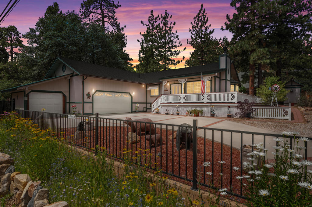 Stunning custom-built home with only 2 owners! Updated in 2007 & very well maintained! This immaculate home offers 3 beds, 2 baths, an oversized 2-car garage w/ 12 ft walls, a second 1-car garage, a circular concrete driveway, all on a huge fully fenced lot w/ 2 sheds & RV parking! Enter the living room to find gorgeous 10 ft ceilings & a beautiful brick fireplace w/ a wood burning stove insert to cozy up to on those chilly winter evenings. Open floor plan leads to the kitchen that offers custom imported Italian granite countertops & backsplash, stainless steel appliances, auto close drawers, & under/over/& inside cabinet lighting! So many wonderful features in this home including a whole house fresh air system, built in surround sound, wood shutters, dual pane windows w/ oversized windowsills, newer water heater, redone copper piping, & more! Beautiful front covered porch & a large back deck w/ a pergola allows for plenty of space for enjoying the outdoors! This oversized lot allows for RV & boat parking & features lilacs, roses, & several fruit trees: including apples, pears, & plums! And you can't miss the wildflowers at the street along the front gate in the summer as you approach! It's stunning! This home is truly amazing! Must check it out! Located within walking distance to the National Forest hiking trails, Easy's general store, Kallan's restaurant & bar, Sugarloaf Post Office, & Sugarloaf Park! Only minutes from the lake, ski slopes, & Village! Don't miss this gem!