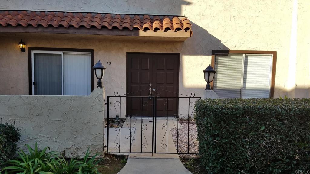 This desirable floor plan in the Park Lane Townhome community is a blank canvas, ready to be personalized. This two-story home features two bedrooms, one and a half bathrooms, and a private gated courtyard, ideal for enjoying evenings outdoors. The newer air conditioning system makes the interior comfortable on hot days. The main living area is downstairs, with bedrooms upstairs. A laundry closet is available for in-unit hookups, or use the community's washer/dryer facility. Enjoy access to a pool and reserve the recreation room for parties. Assigned parking, mailbox, laundry facilities, and the pool are all conveniently located nearby. Main Street in downtown El Cajon offers a variety of shops, restaurants, community events, the VFW, and public transportation—all within a short distance. Nearby schools and convenient freeway access add to the appeal of this property.