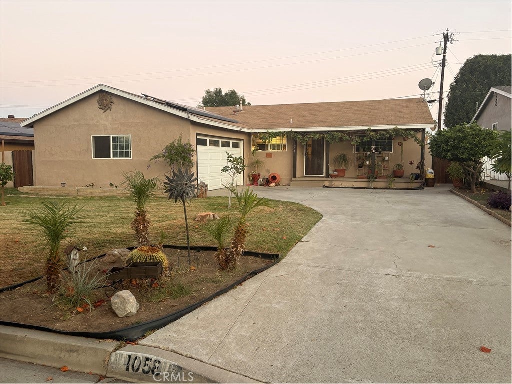 Photo of 1058 Doverfield AVE, Hacienda Heights, CA 91745 (MLS # DW26226338)
