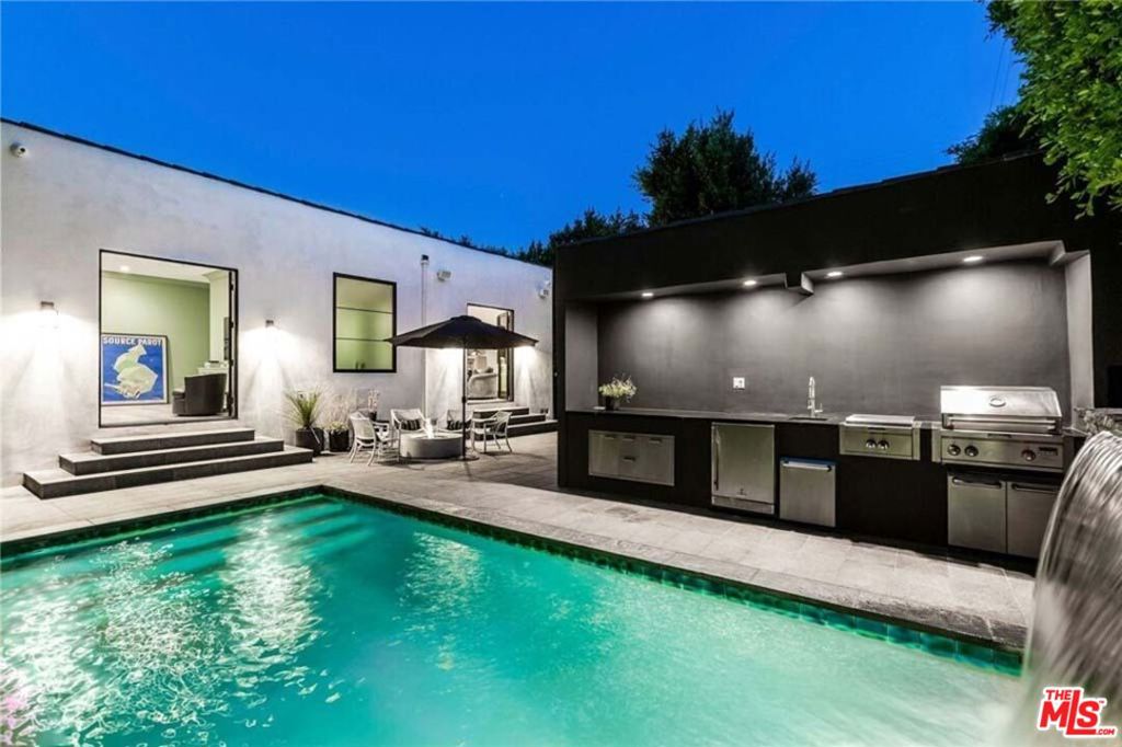 Welcome to your private oasis in the heart of West Hollywood! This stunning, fully-furnished designer contemporary Spanish pool retreat is a true gem, boasting 3 bedrooms and 3 bathrooms spread across 2,166 square feet of luxurious living space. As you enter the property, you'll be greeted by a serene and peaceful atmosphere that feels like a retreat right in the heart of the city. The interiors are bright and airy, with an abundance of natural light flooding through large windows and French doors. The living room features a cozy fireplace and comfortable seating, perfect for relaxing or entertaining guests. This designer smart home features app-controlled temperature, security, lighting and an indoor/outdoor speaker system. The chef's kitchen is great for entertaining and includes Wolf, Sub-Zero and Cove appliances. The adjacent dining area, perfect for hosting dinner parties, has an elegant chandelier overhead and beautiful views of the front yard. The bedrooms are all tastefully decorated and offer ample space and comfort for a good night's sleep. The primary suite features a king-sized bed, luxurious linens, and an en-suite bathroom with a soaking tub and separate shower. The two additional bedrooms offer queen-sized beds and share a well-appointed bathroom. Step outside and discover your own private paradise, complete with a sparkling pool, lush landscaping, and multiple outdoor seating areas for dining, lounging, or soaking up the California sunshine. This property truly has it all - luxury, comfort, and privacy - all in one of the most desirable neighborhoods in Los Angeles. This beautiful modern Spanish pool retreat is just minutes away from some of the city's best restaurants, shops, and entertainment. Don't miss out on this incredible opportunity to experience the ultimate West Hollywood lifestyle!