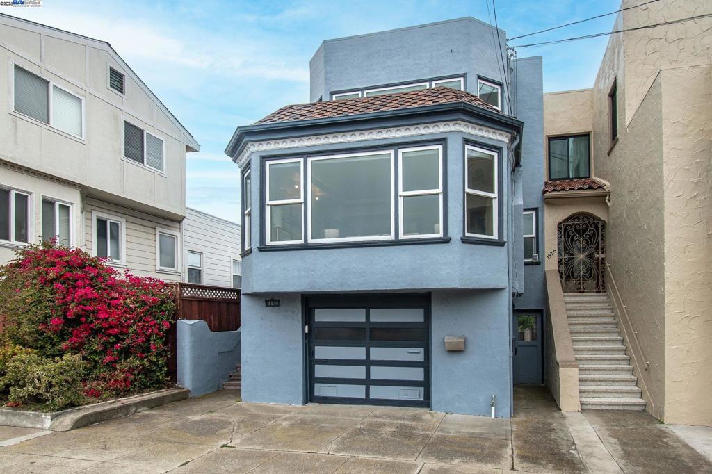 This beautiful three story home has striking curb appeal that captivates upon arrival. This home boasts an updated kitchen with a spacious deck, formal dining room, bright living room, and views of the ocean and Golden Gate Bridge from the bedroom. The ground level with its own separate entry is perfect for guest quarters, artist studio, home office, or entertaining. Conveniently located near 19th Ave, great for commuters to the South Bay. Near Stonestown Galleria Mall, parks, and restaurants. Come see this gem before it's gone!
