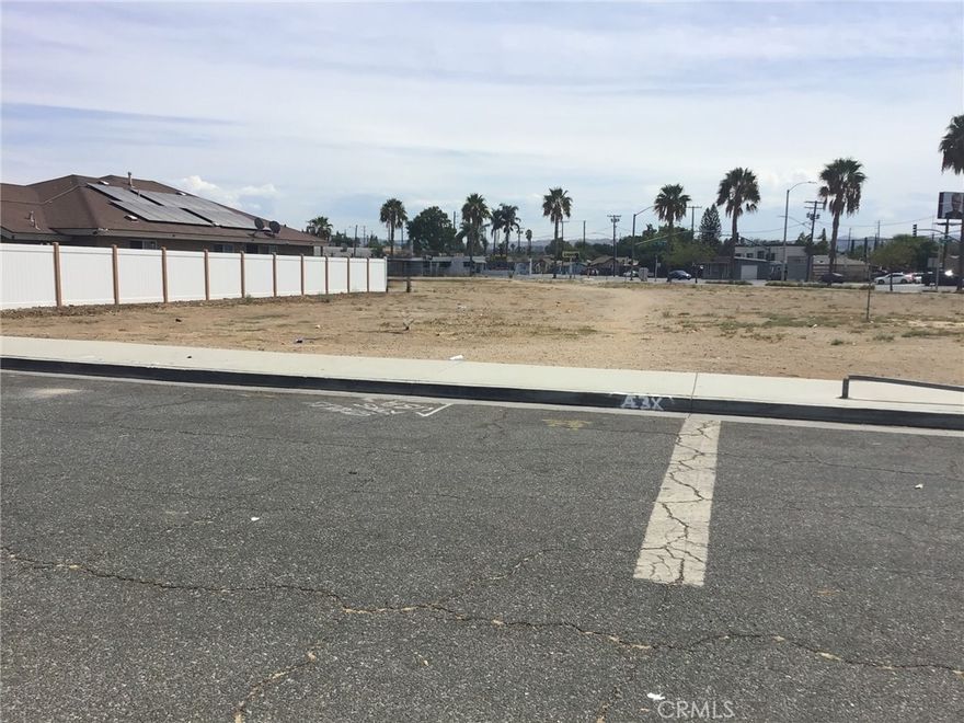 Improved 7405 total sqft  at 5 Points in La Sierra. Property backs up to Hole Avenue. Flat usable commercial land. Has curb and gutters and sidewalk. Corners marked as seen in pictures. 11000 block of Bushnell Ave at Bogart Ave. There are 2 lots being sold together.