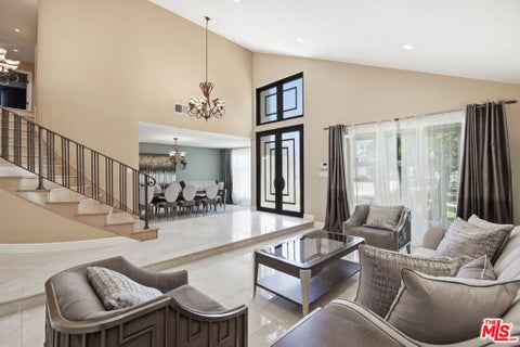 Photo of 8739 Mclennan Avenue, Los Angeles, CA 91343 (MLS # 26860033)
