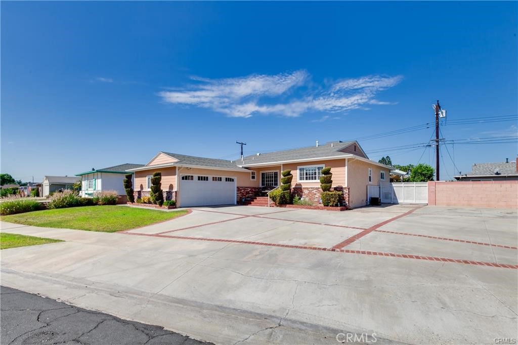 Welcome to your private oasis in East Whittier! This beautifully maintained single-level pool home features 4 bedrooms and 2 bathrooms, located on a peaceful cul-de-sac within a highly rated school district. With over 1,800 sq ft of living space (buyer to verify), the home offers an open-concept layout, original hardwood floors, crown molding, updated bathrooms, a modern kitchen with a farmhouse sink, and newer dual-pane windows.
Recent improvements completed within the past two years include a full roof replacement, whole-house termite treatment, new interior flooring and baseboards, renovated bathrooms, replacement of the backyard sliding door, kitchen windows, and countertops, and an epoxy-coated garage floor.
Sitting on a lot of over 8,100 sq ft, the property includes RV parking and a two-car garage. The spacious backyard is designed for entertainment and relaxation, featuring a heated pool and spa, a shaded patio, and a built-in BBQ area.
Ideally located near schools, scenic parks, and the popular Greenway Trail. Just minutes from Whittwood Town Center, The Quad, and easy freeway access. A rare opportunity to own a move-in-ready home in one of Whittier’s most desirable neighborhoods!