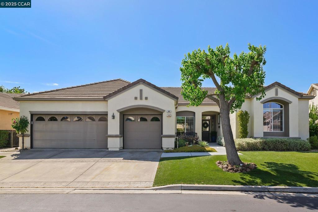 Open Sun., 8/17 1:30-4. Gorgeous home in Summerset, an over-55 community designed for comfort, connection, and convenience. Featuring an OWNED SOLAR SYSTEM WITH BATTERY BACK-UP and EV CHARGER means LOW P.G.&E. BILLS (like, $11/month), so run the A/C during the hot summer months! This SPARKLING CLEAN, modified Chesapeake model shows like a model home and offers two spacious primary en-suite bedrooms—each with walk-in closets—plus an office (no closet) and a bonus room perfect for a game room, crafts, or hobbies. Enjoy cooking in the UPDATED KITCHEN featuring Taj Mahal leather-finish counters, NEWER APPLIANCES, GAS STOVE, a large island with bar counter seating for casual dining or entertaining. Recent upgrades include gorgeous LVP floors, baseboards, interior paint, and more! Step outside to a PRIVATE BACKYARD PATIO and take in the peaceful setting adjacent to open space. The low-maintenance yard gives you more time to relax and explore. Enjoy the privacy, comfort, and charm of this thoughtfully designed home in a welcoming community. Private. Peaceful. Perfect. Summerset 2—Love Where You Live!