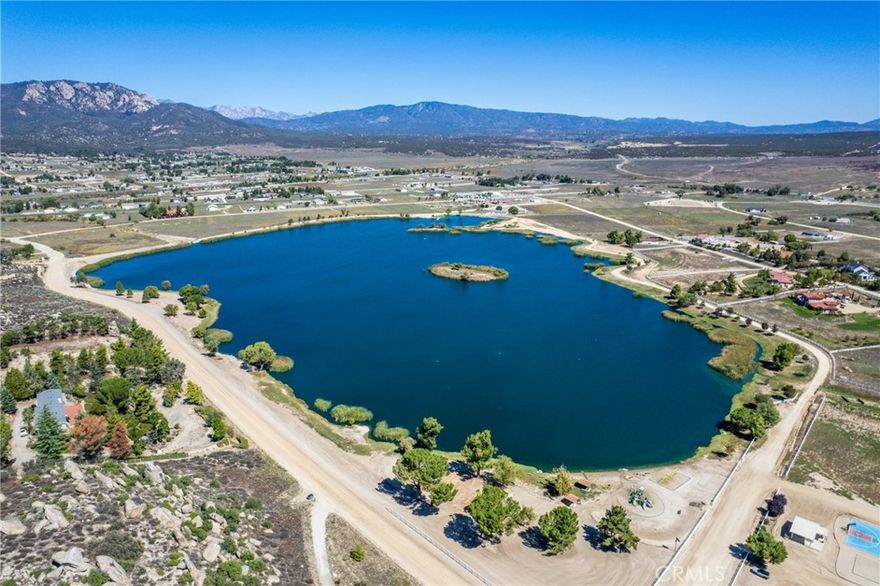 Welcome to Lake Riverside Estates, a premier gated equestrian community just 25 minutes from Temecula Valley. This 3.11-acre cul-de-sac lot offers stunning 360-degree views of Lake Riverside and the Cahuilla Mountains—an ideal blank canvas to design your own private retreat. The possibilities are endless to create the lifestyle you’ve always envisioned.

Residents of Lake Riverside Estates enjoy an array of amenities including equestrian trails, fishing, kayaking, hiking, a swimming pool, community center, picnic pavilion, and basketball and volleyball courts. Experience all four seasons with abundant sunshine and the occasional winter snowfall.

The community also features its own Cal Fire Station and private airstrip for added convenience and peace of mind. This exceptional lot provides the perfect opportunity to build a custom home with a deck overlooking the sparkling lake and breathtaking surroundings.

Discover the serenity, natural beauty, and opportunities that make Lake Riverside Estates one of Southern California’s hidden gems.