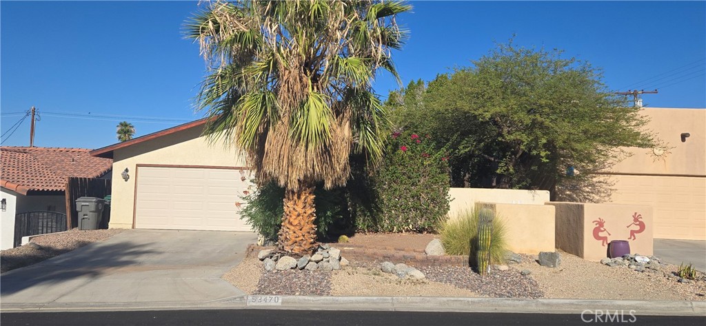 WOW La Quinta Cove- Cute and Cozy 3 Bedroom 2 Bathroom house with a Pool!!! Just in time for Summer Fun and there is plenty to enjoy in the La Quinta cove area. This house located only minutes to downtown and has it all. The nicely remodeled kitchen has Granite counter tops, lots of cabinet space, Dishwasher, Refrigerator, Garbage disposal, Microwave and electric stove. A comfortable living room with solar tube lighting keeps it light and bright. The dining room opens to the covered patio next to the pool. All of the bedrooms are spacious and two to them have views of the pool. The house offers a gated enclosed front yard with an outdoor fire pit for those cool winter evenings There is a two car garage with work bench and storage. Enjoy this highly desired area for its hiking, biking, views, shopping and nightlife. Hurry, this one will go fast.