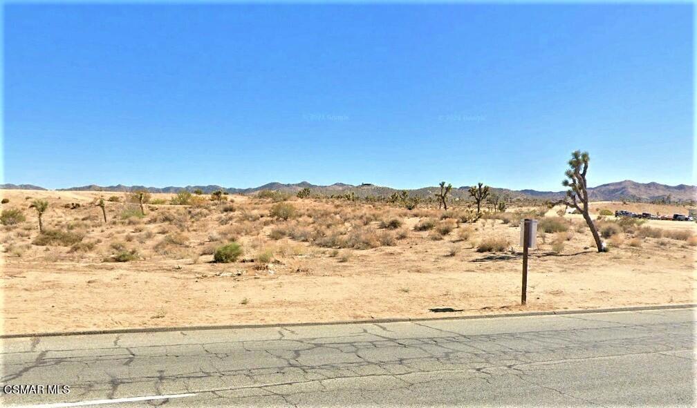 SELLER WILLING TO CARRY WITH HALF DOWN ON APPROVED CREDIT! OWNER WANTS TO SEE ALL OFFERS!! AMAZING OPPORTUNITY!! FABULOUS LOCATION! Yucca Valley - Morongo Basin's commercial core. Tremendous investment opportunity! One acre-plus commercially zoned lot located in the heart of Yucca Valley! Within one mile of Home Depot, Walmart Superstore, Vons, Stater Bros, Applebee's, Starbuck's, Chrysler Dealership and more! New sewer line is in at Hilton Ave. Caltrans estimates 20,000 cars pass the lot daily. The largest marine corps base in the U.S. with over 20,000 residents nearby. Come see for yourself! Over 2,000,000 annual visitors!