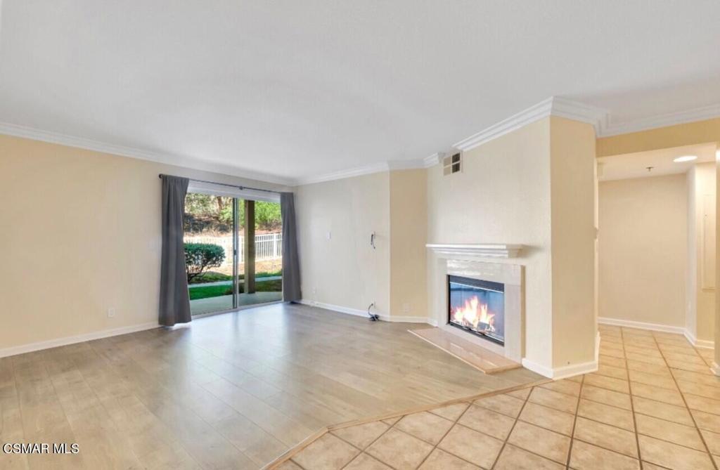 Welcome to this beautifully updated Oak Park condo, perfectly positioned in one of the community's most desirable locations. Nestled in a private setting and backing to tranquil open space, it offers scenic views from both the living room and bedroom. The bright, inviting living area features a cozy fireplace and opens to a covered patio--ideal for relaxing or entertaining. The kitchen flows effortlessly into the living space and includes a dining area. The spacious bedroom boasts a large walk-in closet and direct patio access. Enjoy resort-style amenities including sparkling pools, a clubhouse with gym, picnic areas, a volleyball court, and more--all within the boundaries of California's award-winning schools.