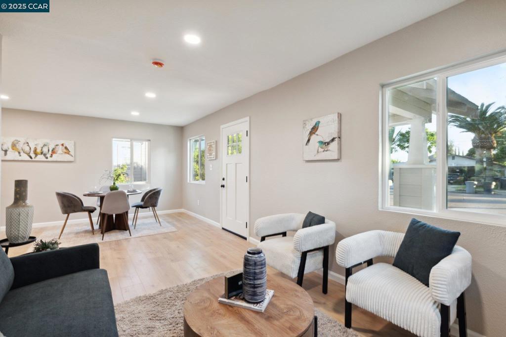 Step into the charm of the past with the comfort of today in this completely reimagined 1920 bungalow, offering approximately 1,500 sq ft of brand-new living space. From the moment you arrive, the fresh landscaping, new exterior siding, and inviting front porch set the tone for what’s to come. As you walk through the front door, you’re welcomed into a bright, open-concept living and dining area, featuring new laminate wood flooring, recessed lighting, and plenty of natural light. The heart of the home; fully updated kitchen boasts quartz countertops, stainless steel appliances, and a clean, modern design. Just off the kitchen are two spacious bedrooms with generous closets, offering flexibility for guests, a home office, or growing needs. The primary suite is tucked privately toward the back of the home and offers ample space to unwind, including a cozy sitting area, large closet, and beautifully finished en-suite bathroom. Every inch of this home has been rebuilt—from the new roof, mini split HVAC system, dual-pane windows, and insulation. The front yard features a new sprinkler system, and out back, room to create your dream space. All of this and you’re just minutes from Oakdale’s vibrant downtown shops, dining, and charm. —it’s truly turn-key and move in ready.