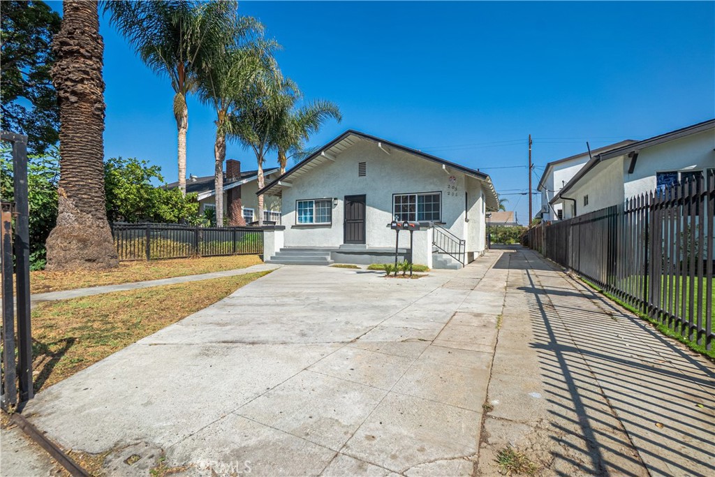 Opportunity knocks in South LA! Two separate residences on one lot – each a spacious 3 bed / 2 bath – delivering a combined 6 bedrooms and 4 bathrooms across front and rear structures. The front unit has been pleasantly updated with laminae wood floors, quartz counters and shaker cabinets, modern systems/fixtures. The rear unit was built in 2001 and finalized in 2005. Those building features include foundation, electrical, HVAC, and more, all completed with permits and signed off by LADBS inspectors (Permit are listed in the supplements). This property offers excellent cash-flow potential and versatility for an owner-user or investor. Conveniently located near schools, shopping, and freeway access. Do not disturb occupants.