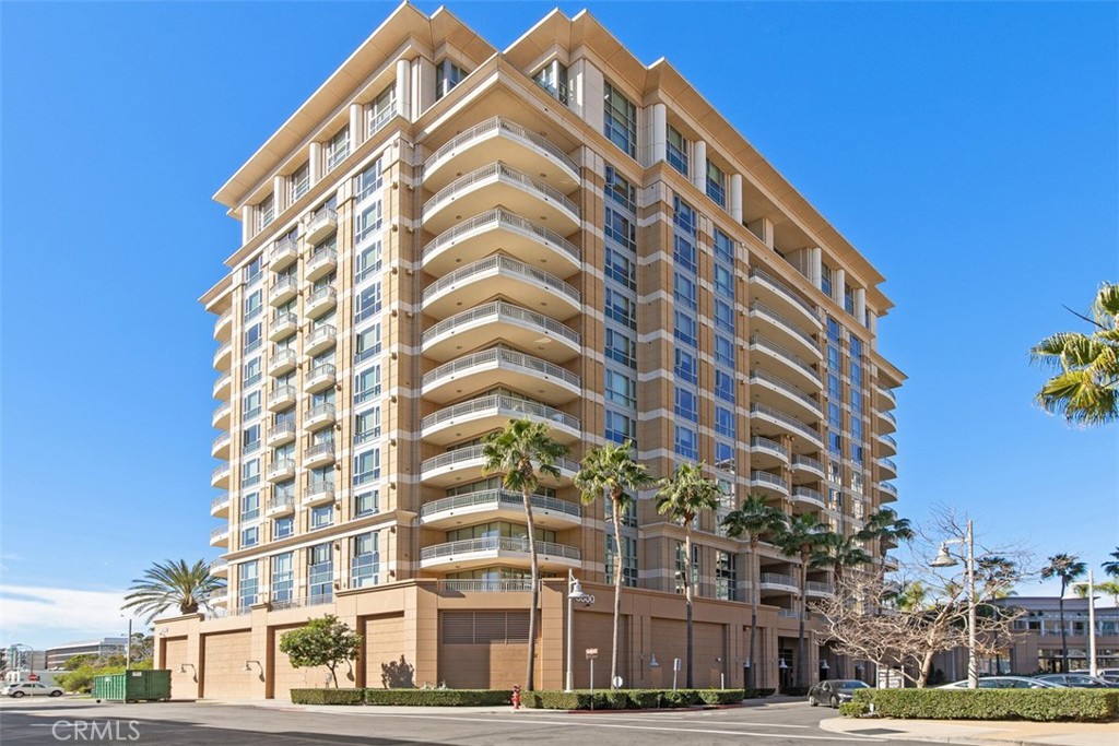 Welcome to 8073 Scholarship, a sophisticated 2-bedroom, 2.5-bath residence located on the 7th floor in the highly sought-after Plaza Irvine—one of Orange County’s premier high-rise communities. Set in the heart of the Irvine Business Complex, this contemporary home offers a perfect blend of luxury, comfort, and convenience. Step inside this 7th floor home to discover an open-concept layout with floor-to-ceiling windows and elegant designer finishes throughout. The gourmet kitchen is equipped with Viking stainless steel appliances, granite countertops, custom cabinetry, and a generous island that flows effortlessly into the living and dining areas—ideal for both everyday living and entertaining. There are 2 en-suite bedrooms and the spacious primary suite is a tranquil retreat, featuring a spa-inspired en-suite bathroom with dual vanities, a soaking tub, and a large walk-in closet with custom built-ins. A stylish powder room adds convenience for guests, and in-unit laundry enhances functionality. Enjoy peaceful moments or evening sunsets from the private balcony, with views of the surrounding cityscape. This home also includes two dedicated parking spaces plus a storage room and access to resort-style amenities, including: 24-hour concierge and security, State-of-the-art fitness center and yoga studio, Sparkling pools and spas and sauna, Clubhouse and business center, On-site dining and retail options. Perfectly situated near John Wayne Airport, Fashion Island, South Coast Plaza, and major freeways, 8073 Scholarship offers refined living in one of Irvine’s most vibrant urban hubs.