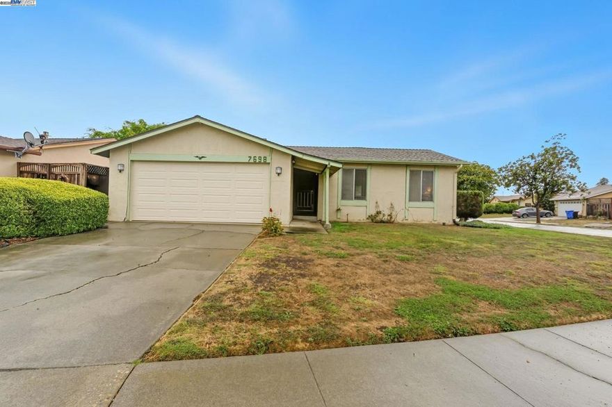 If you are looking for a home on a quiet court with awesome commute access to CA-84 and the Dumbarton Bridge, this is the home for you! Having faithfully served one family for a generation, this home is ready for the baton to be passed on to the next. Sold in its original condition, this home is a blank slate to be reimagined with a spacious yard and corner lot ready to be transformed to fit your vision.  As you enter, the vaulted ceiling in the living room invites you in. A corner fireplace stands ready to remove the chill on cool evenings and the expansive windows allow ample light to stream in. The kitchen and dining area are conveniently located off to the left and provide access to the covered rear deck. Access to the 2-car garage is also conveniently off the kitchen.  Down the hall, the bedrooms stand ready for new occupants!  The primary bedroom is located at the rear for privacy and shares access to the bathroom. The possibilities are endless and there is ample room in the rear yard to add an ensuite bathroom.   If you love opportunity, this home fits the bill. Priced with its condition in mind, the only thing it needs is a person with imagination who’s longing to find a diamond in the rough and transform it into the home of their dreams. Don’t let this one get away!