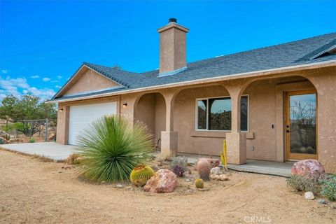 Photo of 5099 Balsa Ave, Yucca Valley, CA 92284 (MLS # JT26084156)