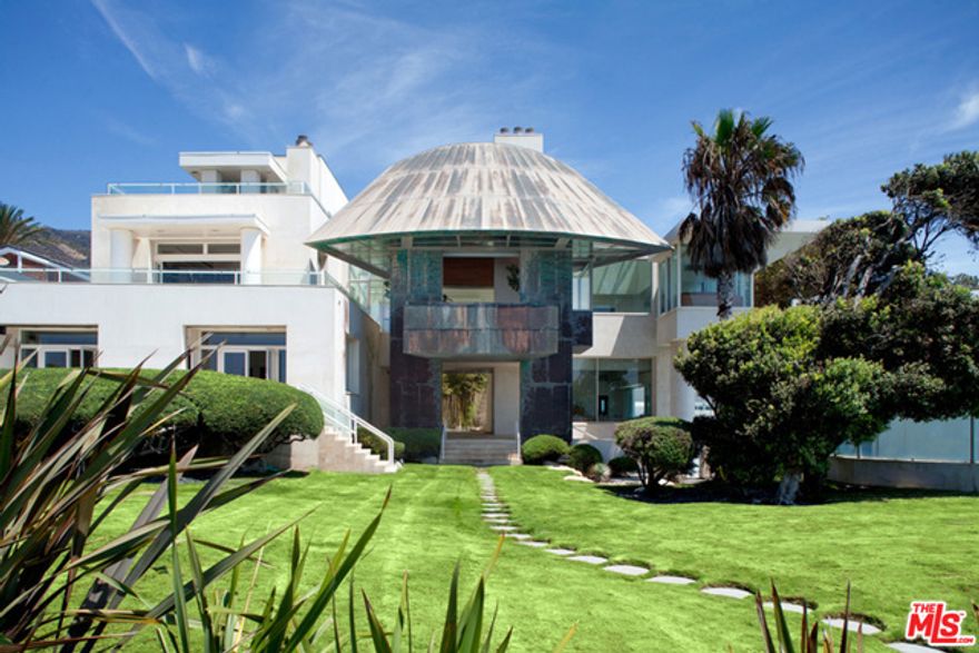 Court ordered partition sale subject to overbid in Los Angeles Superior Court 02/07/17 at 8:30am, 111 N. Hill Street Dept. 11, Los Angeles, CA 90012, contact Listing Agent for bidding instructions. An architectural connoisseur's dream designed by Frank Gehry. World class beachfront trophy property encompassing multiple parcels with an unprecedented 160 ft of beachfront in the most prime section of Broad Beach. Featuring over 11,000 sf, iconic design with sunlit courtyard entry, soaring ceilings, great walls for art, old walls of glass overlook magnificent garden, tennis court, lap pool and deep sandy beach. An incredible once in a lifetime opportunity that can never be replicated.