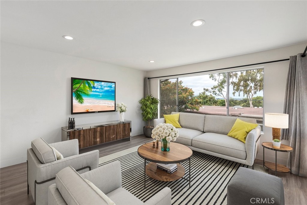 Welcome to this beautifully remodeled 2-bedroom, 1.5-bath townhome in the desirable Friars Village community. With 1,081 sq ft across two levels, this home features a bright open layout, upgraded flooring, recessed lighting, and oversized windows that fill the space with natural light. The main level offers a spacious living room, dining area, guest bath, and an updated kitchen with shaker cabinets, stainless steel appliances, and a modern tile backsplash. A large enclosed balcony extends the living space—perfect for relaxing or entertaining. Downstairs, you’ll find two comfortable bedrooms, a full modern bathroom, and convenient in-unit laundry. Additional features include mini-split A/C, 1-car garage, carport parking, and a layout that smartly separates living and sleeping areas. Enjoy access to Friars Village amenities including a pool, spa, clubhouse, and walking trails—all just minutes from Fashion Valley, USD, and major freeways. This move-in-ready home offers comfort, style, and a prime San Diego location.