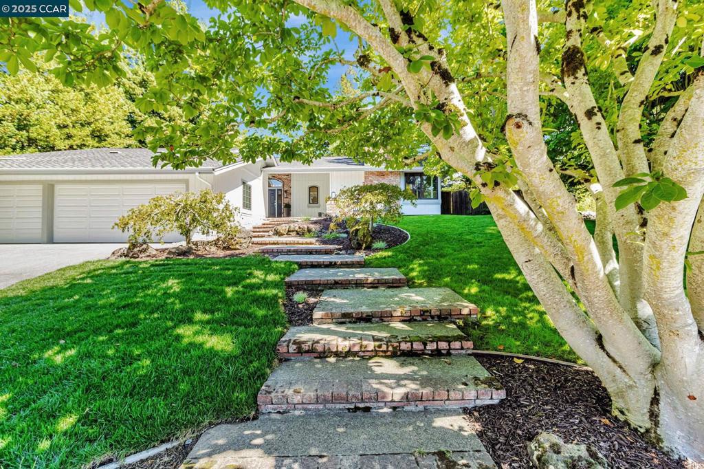 Nestled in a very popular gated community of Sanders Ranch, this sophisticated single level home represents the ease and comfort of California living. Some of the great finishes include wide plank engineered hardwood floors throughout, brand new Andersen windows & doors, interior & exterior paint, new HVAC, water heater and more. The generous living and dining rooms provide a direct access to the backyard. The kitchen with new Quartz countertops, wine fridge, new refrigerator and a breakfast nook is truly the heart of the home. The family room is adjacent to the kitchen and features vaulted beamed ceiling, a gas fireplace and access to the yard. All four bedrooms are conveniently located in the same wing of the residence. The beautiful backyard was just recently landscaped with a new lawn, stone pavers and gardens. Enjoy peaceful living in this great house with just minutes to Moraga's award winning schools.