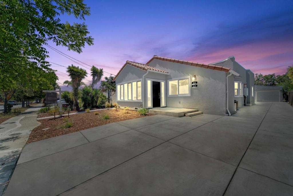 Welcome to this recently remodeled 4 Bed 2 bath Mt. Carmel charmer! The elegant engineered flooring and the great color combination brings warmth throughout the home. The open kitchen features a 36" gas Forno stove, modern white cabinets, quartz countertops and an island that's perfect for entertaining. New windows, interior doors, casing and trim and LED lighting throughout. The hallway bath includes a double sink with KOOZZO faucets , Toto toilet, Hansgrohe shower trim. The spacious primary suite has top end finishes including a Toto toilet, Hansgrohe shower trim, walk-in shower, frameless shower doors, double vanity with cool LED mirrors and Elegant tile that accentuates all of the modern features. The extensive remolding includes all new electrical, plumbing, furnace, A/C roof, stucco and so much more. Property can also function as a 3Bed 1 Bath with 1Bed 1Bath ADU (separate entrance) perfect for an extended family or potential rental income.