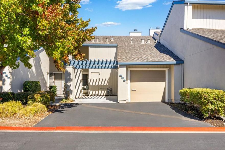 Welcome to this charming townhome located in the highly desirable Shell Cove complex! This unit was an original model  that has 1,270 sq ft of living space, 2-bedroom, 1 1/2- bathrooms that offers a comfortable and convenient lifestyle. The kitchen is a standout, with granite countertops, an island & high end cabinetry with a door that leads to large patio area for dining, gardening & soaking up the sun.   The home features a mix of carpet and hardwood flooring, adding a touch of elegance throughout. Enjoy cozy evenings by the fireplace in the living room, which also includes a dining area. The bathrooms are beautifully appointed with granite, tile, and travertine.   Additional amenities include central AC and central forced air heating for year-round comfort. The laundry area is conveniently located in the attached garage, The only unit with 3 additional parking spots directly in front. Residents can take advantage of the community pool, tennis courts, rec room & playground for the kids! Steps to the bayfront walking/biking trail. The property is within the San Mateo-FC Elementary School District. Close to all freeways, school, shopping, transportation, restaurants, golf courses and so much more! Move-in ready, just unpack and start living the dream! Run, don't walk to this one!