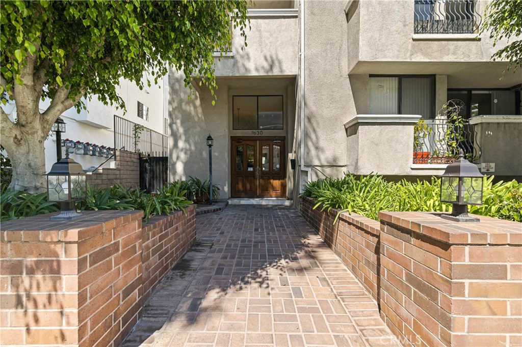 Welcome to this bright, freshly painted and luxury 2 bed, 2.5 bath front unit condo with high ceilings in the heart of West Los Angeles with close proximity to shops, restaurants on Santa Monica Blvd, Century City, Westwood, Santa Monica, the beach and 405 FWY. Double door entry leads you to a large living room with fireplace, balcony access and wet bar. Very large dining area. Complete and amazing kitchen with breakfast area, pantry, quartz counter tops, backsplash, microwave and wine refrigerator open to formal dining area. Open floor plan, great for entertaining. large master suite with balcony, huge walk-in closet with dual access and beautiful bathroom with double sink, separate tub and shower. Good sized second bedroom as well. Brand new side by side washer and dryer and refrigerator is included. Other features include powder room, smooth ceilings, recessed lighting, plenty of closet space, beautiful wood and marble floors. 2 car parking with storage area. Great small building with nice lobby area on a great tree-lined and quiet street. Prime location.