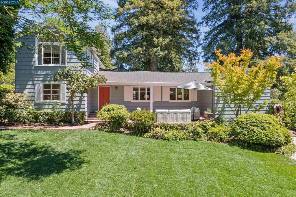 A Storybook Retreat in the Heart of Orinda | Tucked along a quiet, tree-lined street, this charming 1939 farmhouse captures the essence of classic California living. Fresh ext/int paint, refinished & new hardwood floors and a country-style kit w/garden views, new counters and gas cooktop. Beyond the brick porch and lush gardens, the living room features a wood-beamed ceiling, cozy fireplace, and French doors opening to a pvt courtyard. The pvt primary suite includes a sitting area, cheerful bath, and bonus room for a home office/4th bedroom. Entertain with ease in the formal dining room, where built-in curios add a touch of vintage elegance. Upstairs, two vaulted-ceiling bedrooms and a full bath provide inviting spaces for family or guests. Surrounded by lush gardens on all sides, meandering paths lead you through vibrant landscaping, including a blooming hydrangea garden, vegetable beds, a newly expanded lawn. Mature trees offer dappled shade on sunny days, while a charming gardening shed adds both function & charm. A classic white picket fence w/gates frames the property, completing the picturesque setting. With vintage details and a location minutes from shopping, dining, BART, and freeway access, this home feels like a peaceful countryside escape- yet close to everything.