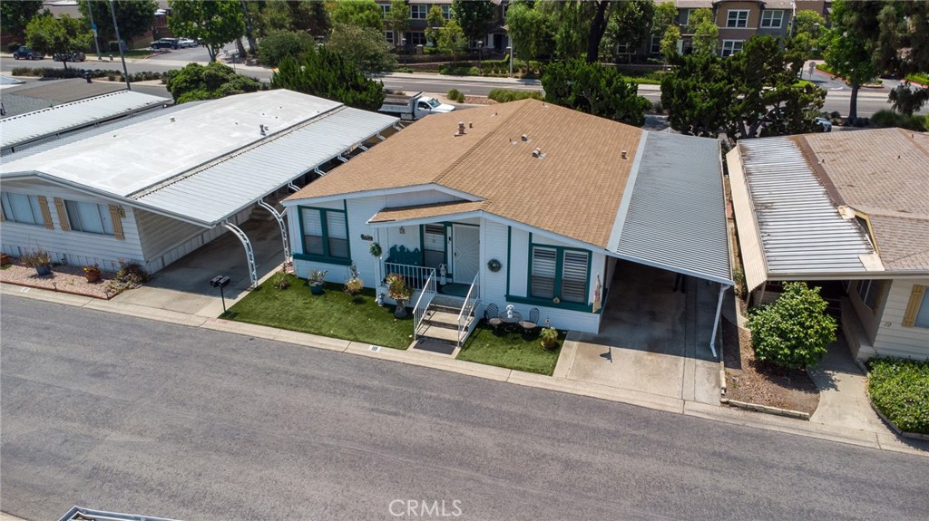 Welcome to this fully upgraded home in the highly desirable 55+ park that is Casitas La Verne! Come on down to the beautiful city of La Verne nestled against the foothills. Walk up the stairs to your large covered patio where you will find an inviting entrance to your new home.. This gorgeous home would be a delight to anyone. Included in the park is a swimming pool and a big gathering room with connecting billiard room. Its w very well kept park. This home is a triple wide, you walk up a few stairs to the front patio, inside is a huge living space containing a dinning room and living room with space galore. Just on the other side of this formal dining you have a bar into a nice size kitchen. Laundry is just on the other side. Then a door to your outside oasis. Clean drive way and a storage shed next to the inviting backyard. One nice place to relax. Now on the other side of living room you see a connecting french door making your way to the first bedroom. Once to come out of the hall you step in a large bathroom. Next door to that is the large master bedroom and the master bathroom is amazing as well. Across the hall is another bedroom
This is a must see for all those looking for nice park and nice home.