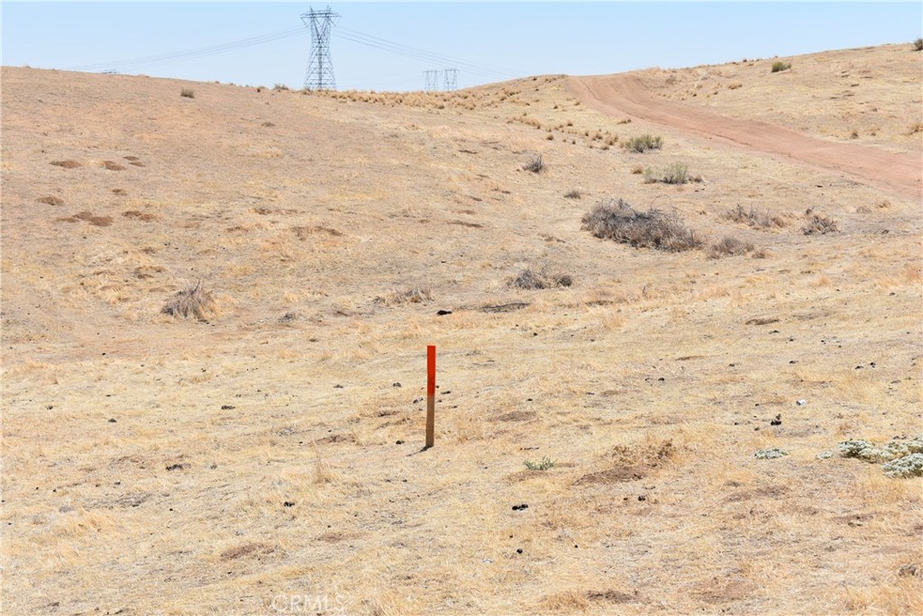 2.48 acre lot near the northwest end of the California Poppy Reserve. Zoned A12 for agriculture, animals. and a home. APN 3263-014-001. Approximate corners have been marked.