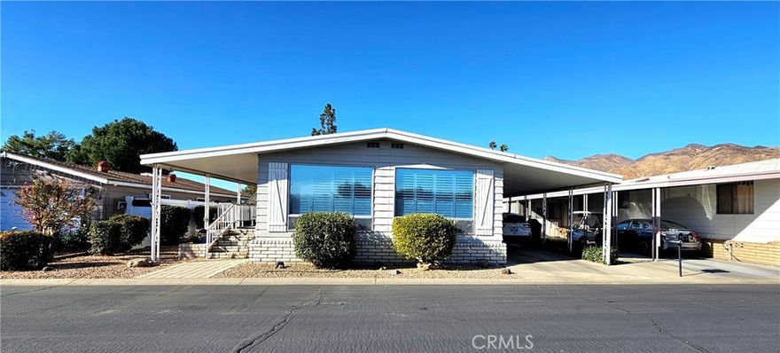 Get 3 Months of Space Rent for Free!!!  Welcome to 2230 Lake Park Dr, Space 221—a beautifully maintained two-bedroom, two-bath home in the secure and private Soboba Springs Mobile Estates, a 55+ gated community recently nominated for a Beautification Award. This delightful residence offers stunning mountain views and access to an array of amenities, making it the perfect place for an active and serene retirement.



Located just across the street from Soboba Casino and Golf Course, you’ll have endless dining and entertainment options right at your fingertips. Within the community, enjoy a vibrant lifestyle with a clubhouse hosting fun parties and activities, a picturesque fishing pond with a dock, a gym, a pool room, and a relaxing pool and spa, among many other features.

This charming home faces lush green hedges with no neighbors to block the private and peaceful setting. Inside, the inviting living area is bathed in natural light filtering through the Plantation Shutters, creating a warm and cozy atmosphere. The open floor plan seamlessly connects the living room, dining area, and kitchen, perfect for both everyday living and entertaining. 



The well-appointed kitchen offers ample cabinet space, ideal for preparing anything from simple snacks to gourmet meals. The spacious primary bedroom provides a restful retreat with a mirrored double-wall closet and an ensuite bathroom featuring another closet and a tub/shower combo for ultimate comfort. A second bedroom adds versatility, and the Arizona room is perfect for a home office, gym, or hobby space.



Outside, relax on your private front porch while savoring your morning coffee and taking in the lush green scenery and breathtaking views of the San Jacinto Mountains. This home combines comfort, convenience, and community living at its finest—don’t miss the chance to make it your own!