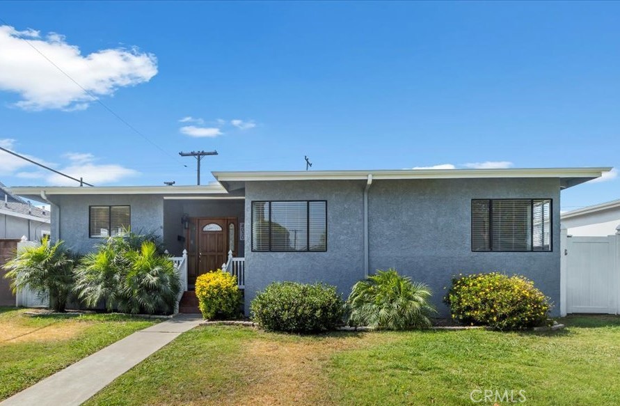 Great 3 bedroom 2 bath (1+1/2) North Torrance "pool home" - move in ready - curb appeal and more - step up on the porch and into the comfortable living room on new laminate floors - plus a brick fireplace and an eating with a chandelier - updated kitchen for the chef in the family with granite counters, lots of cabinets, stainless appliances, recessed lighting and exit door to the side yard - good size step down family with half bath and direct backyard access to the nice size patio and large pool - primary bedroom - fresh interior and exterior paint - forced air heating - new laminate flooring - spacious back yard with a good size patio area and a huge pool to exercise, swim in , pool party or just beat the heat - outdoor fun and enjoyment -double detached garage with auto opener - laundry in the garage - sprinklers - forced air heating - convenient to award winning schools + shopping + medical + restaurants + 20 minutes or so to the beach - freeway access - excellent opportunity to get in this highly desirable neighborhood - what are you waiting for?