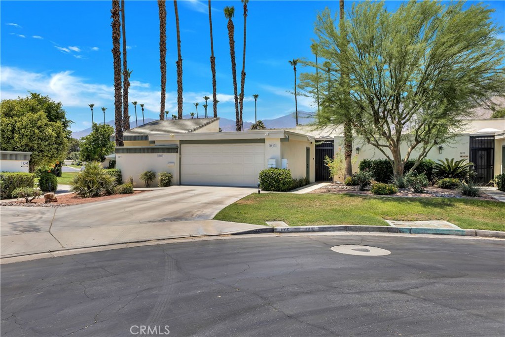 Dare to compare...location, floorplan, view and quality. This single level condo, with no one above and no one below is at the end of a quiet cul-de-sac and has a sensational view. A private, gated entrance opens to a secluded entry courtyard. Then, double glass doors welcome you to a home whose design and quality far exceeds most rental properties. The kitchen is recently upgraded with high end appliances including a built-in KitchenAid fridge and dishwasher, a new Samsung five burner, self-cleaning oven and microwave, LED lights and under cabinet lighting. Soft-closing cabinet drawers. Spacious breakfast bar and an under cabinet-built-in wine cooler. The oversized living room has a custom fireplace and large flat screen TV, vaulted ceiling with new ceiling fan light. Sliding doors with motorized shades lead out to a private patio with panoramic mountain views. The dining area is large enough to seat eight comfortably. The primary bedroom is larger than most. You will love the remodeled bath complete with a large walk-in closet and a sumptuous walk in shower. Bedroom two is also larger than most. Mirrored wardrobe closet doors and a glass slider leads out to a private front courtyard. There is even a private laundry room with extra storage space and a one car garage with an EV charger. New artwork throughout. Located near Mesquite and Sunrise this is walking distance to shopping and a short drive to downtown. And you'll love the quality and style of the furniture. This highly upgraded condo is available fully furnished for a minimum one year lease to qualified applicants. Landlord pays HOA. If you have been searching properties to rent, you will be very pleasantly surprised when you see this one. Everything is top quality; from the high-end kitchen appliances, upgraded cabinets, decorator designed furniture, custom shower in the primary. At the end of a quiet cul-de-sac street and a sensational mountain view. One year minimum lease.