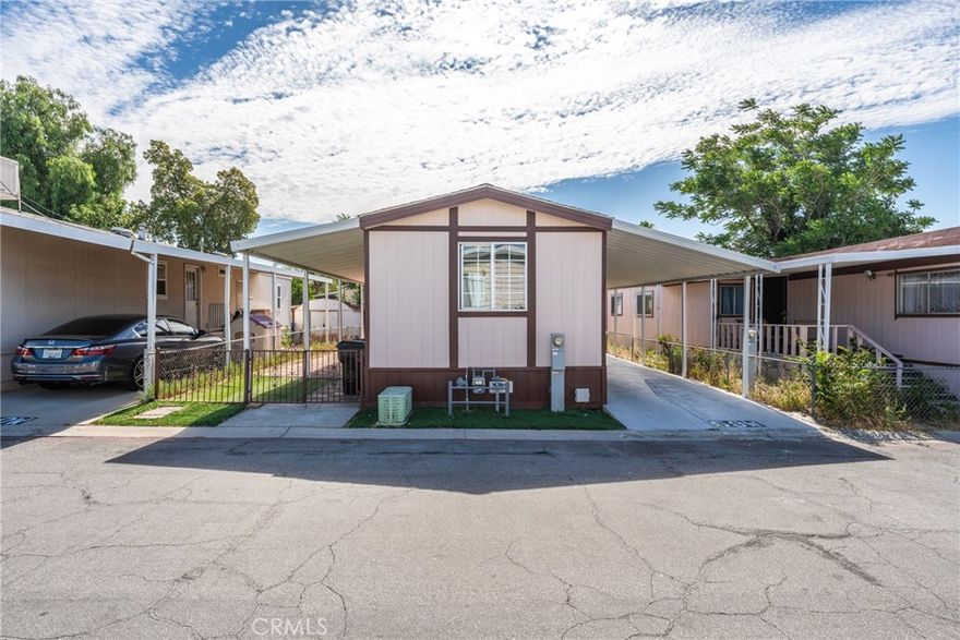 Welcome to this well-maintained manufactured home located in one of the best parks in Fontana, CA! This 2-bedroom, 2-bath home features a BRAND-NEW ROOF and is completely move-in ready.

Enjoy a spacious layout with a bright kitchen that opens to the main living area, perfect for everyday living and entertaining. The home also offers both a front and backyard, plus a cozy front porch—ideal for your morning coffee.

Located in a quiet, clean, and well-kept community with low space rent, this home is a rare find and an affordable opportunity.



Don’t miss out—schedule your private tour today



PROFESSIONAL PICTURES COMING SOON