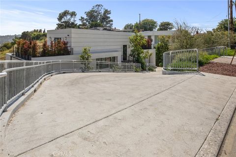 Photo of 1479 Highgate AVE, Los Angeles, CA 90042 (MLS # BB26099264)